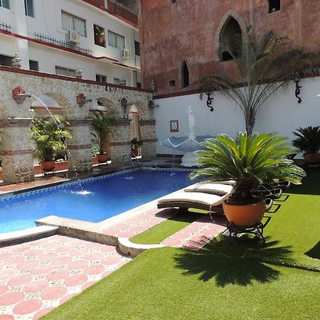 Hotel Tajin ปาปันตลา เด โอลาร์เต ภายนอก รูปภาพ