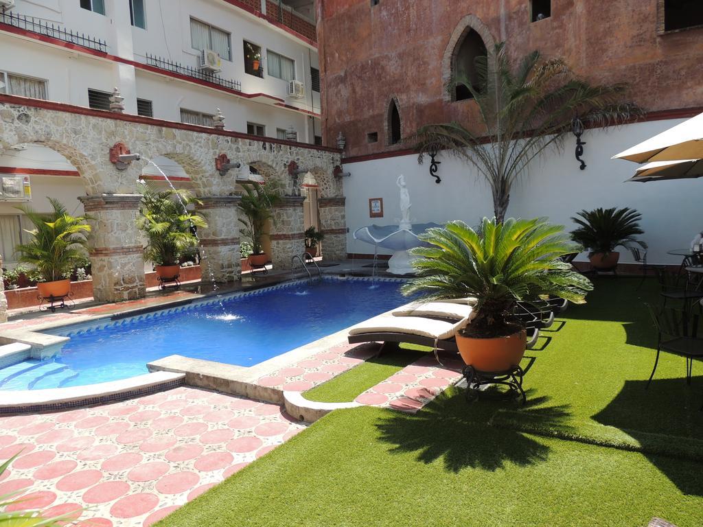 Hotel Tajin ปาปันตลา เด โอลาร์เต ภายนอก รูปภาพ